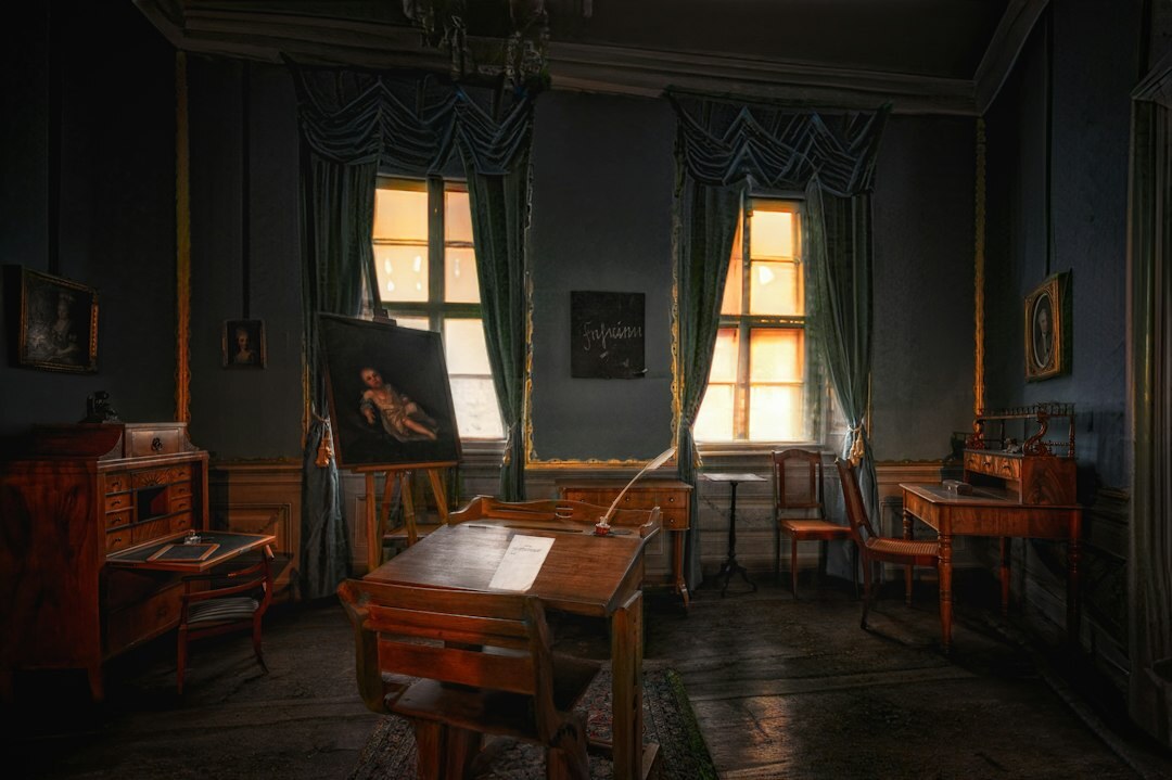 Small independent newsroom office interior with desks and papers