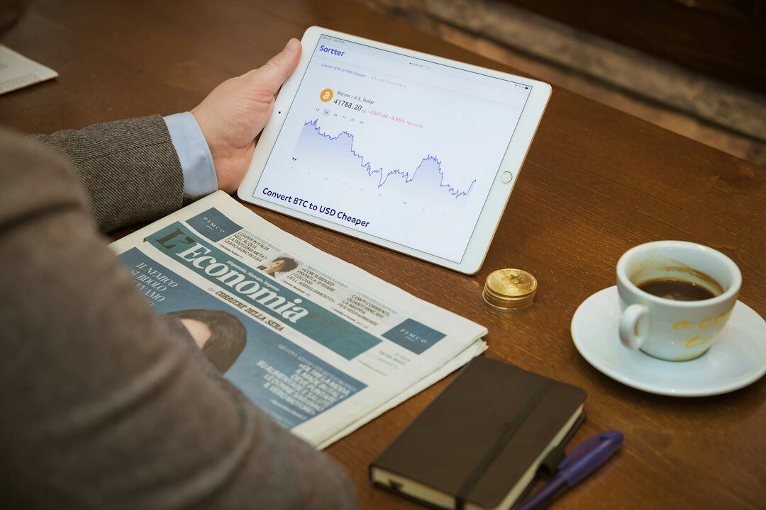 person reading financial news