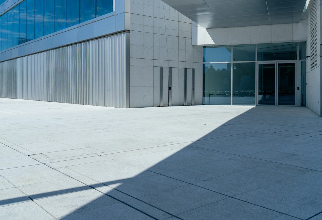 Corporate office building entrance with glass doors