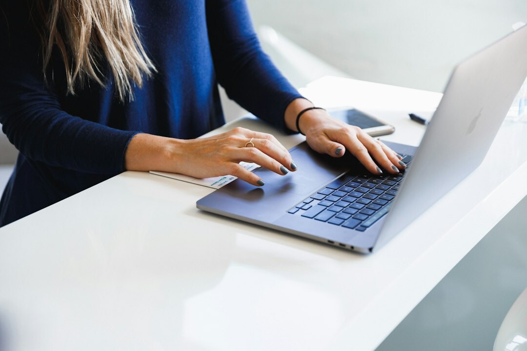 person using laptop for research